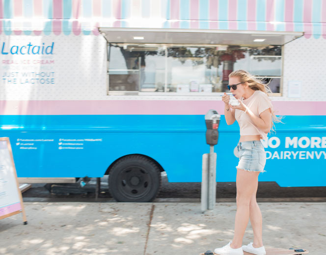 A woman eating a Lactaid lactose-free dairy product as part of the No More Dairy Envy campaign created by the HUNTER integrated marketing and PR firm in NYC.